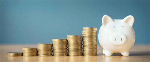 Reserve Contributions stacks of coins leading to a piggy bank